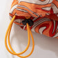 Orange Swirl Puffer Vest